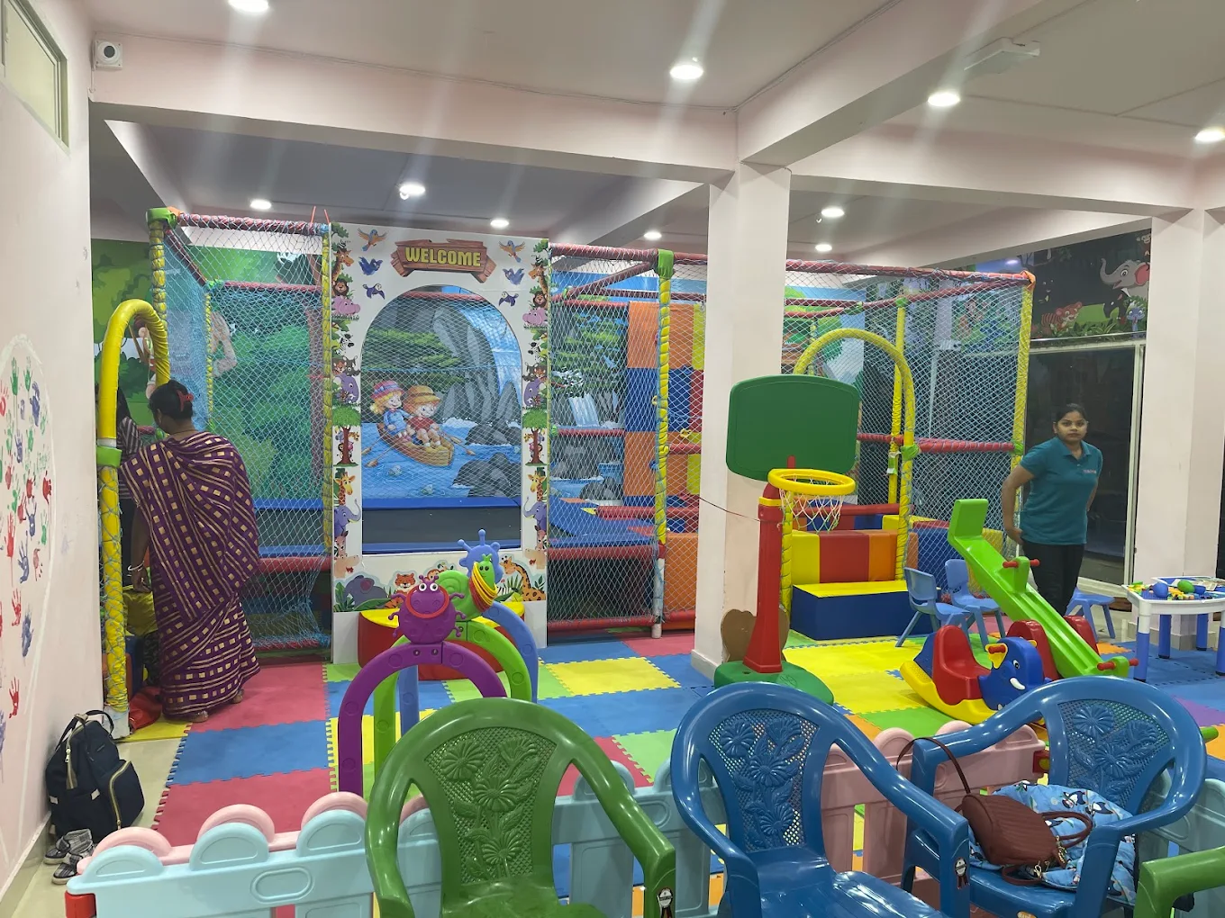 Indoor play centre layout with trampoline and activities